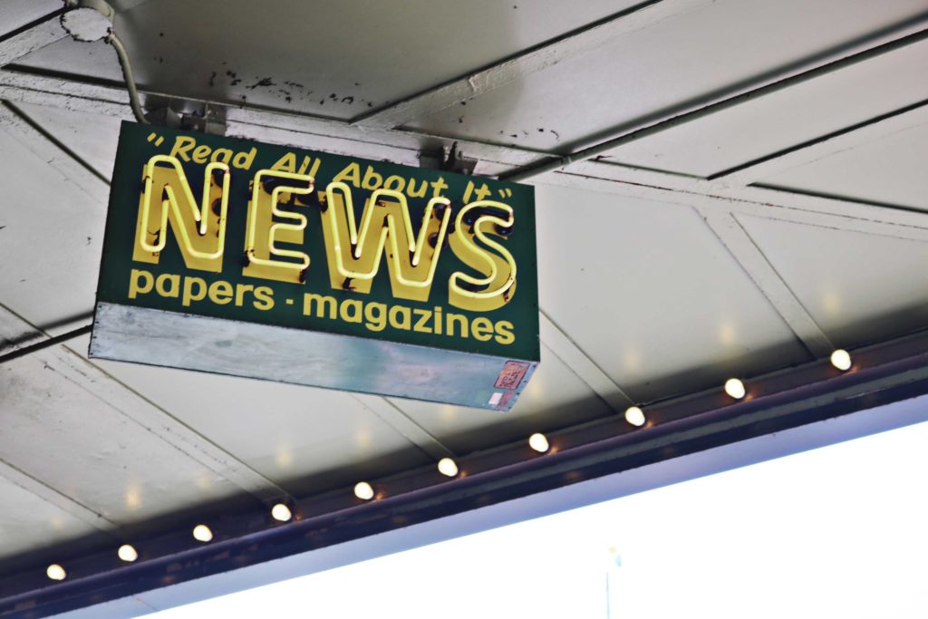 Sign: Read All About it News Papers Magazines